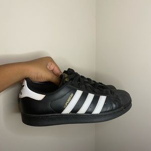 Black and white Adidas Superstar